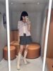  Chân váy ngắn xám xếp ly, cạp thun kẻ C.Charles 