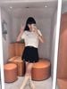 Áo trắng ngắn tay, cổ tròn, viền - gấu đen 