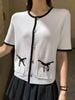  Áo CDG ngắn tay trắng viền đen, 2 túi nơ 