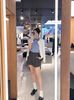  Áo CDG trắng kẻ sọc dọc, họa tiết gấu xanh 