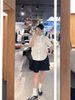  Áo sơ mi trắng tay lửng , cổ thắt nơ cà vạt, cúc đen Logo 