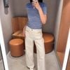  Quần jean trắng, cúc đính đá - 2 túi Logo xích vàng 