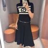  Chân váy xòe dài đen, cạp thun logo chữ chạy 