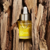 Dầu Dưỡng Clarins Làm Dịu Và Thư Giãn Da Khô 30ml Santal Treatment Oil