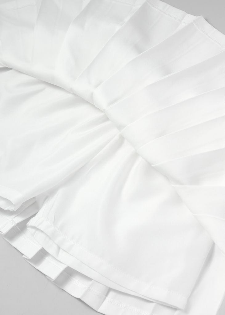 Chân Váy Quần Xếp Ly Bé Gái Trắng Kem 02
