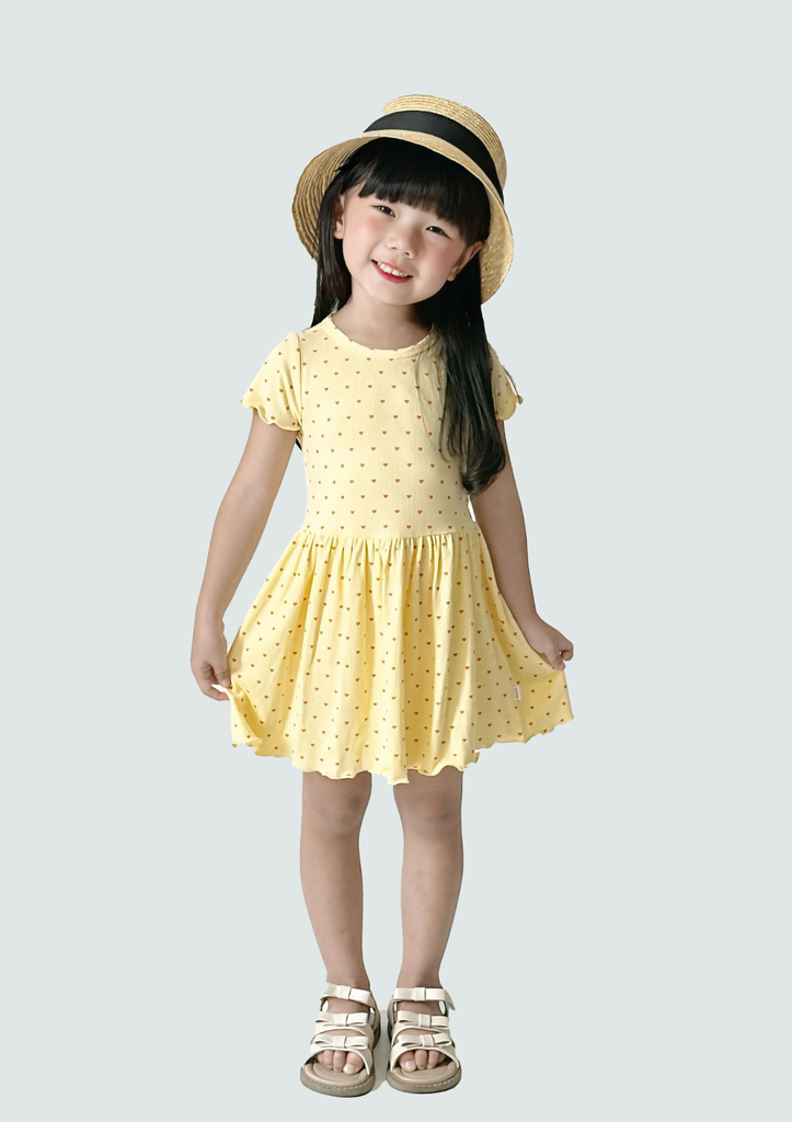 Đầm Thun Kiểu Bé Gái Vàng Gân Họa Tiết Trái Tim