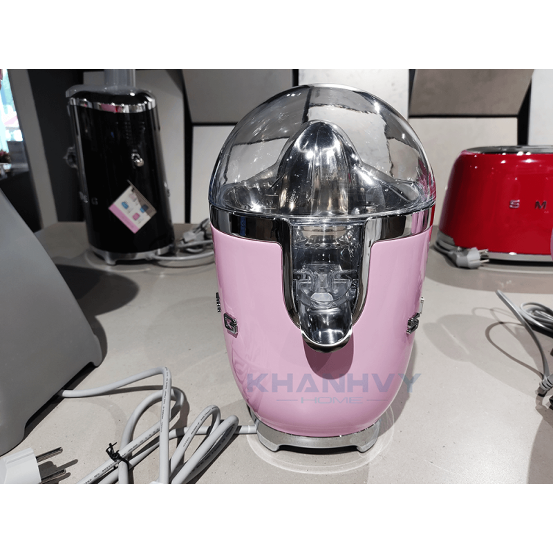 Máy ép cam màu hồng Smeg CJF01PKEU 535.43.646
