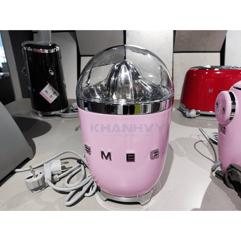 Máy ép cam màu hồng Smeg CJF01PKEU 535.43.646