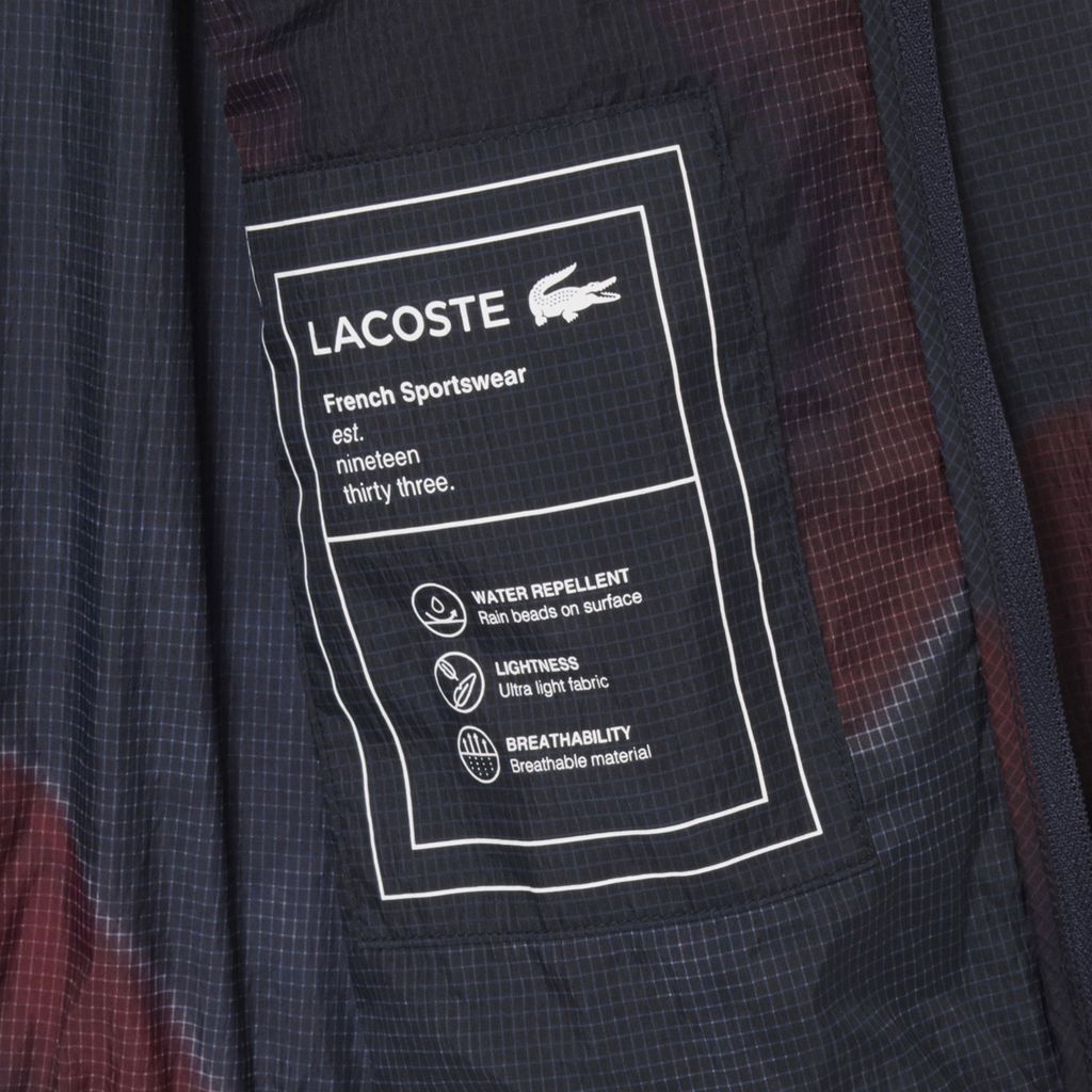 Áo Khoác Lacoste Nam Dáng Ngắn Chất Liệu Ripstop Nhẹ Họa Tiết In