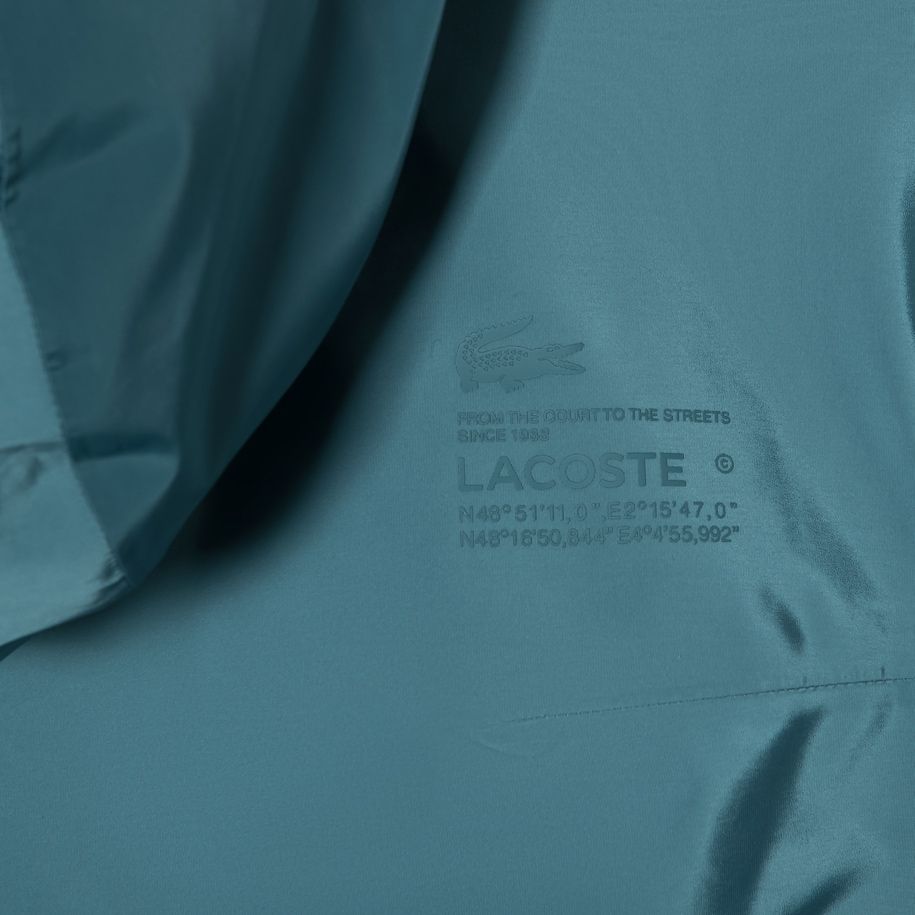 Áo Khoác Thể Thao Lacoste Nam Có Mũ Chất Liệu Chống Mưa