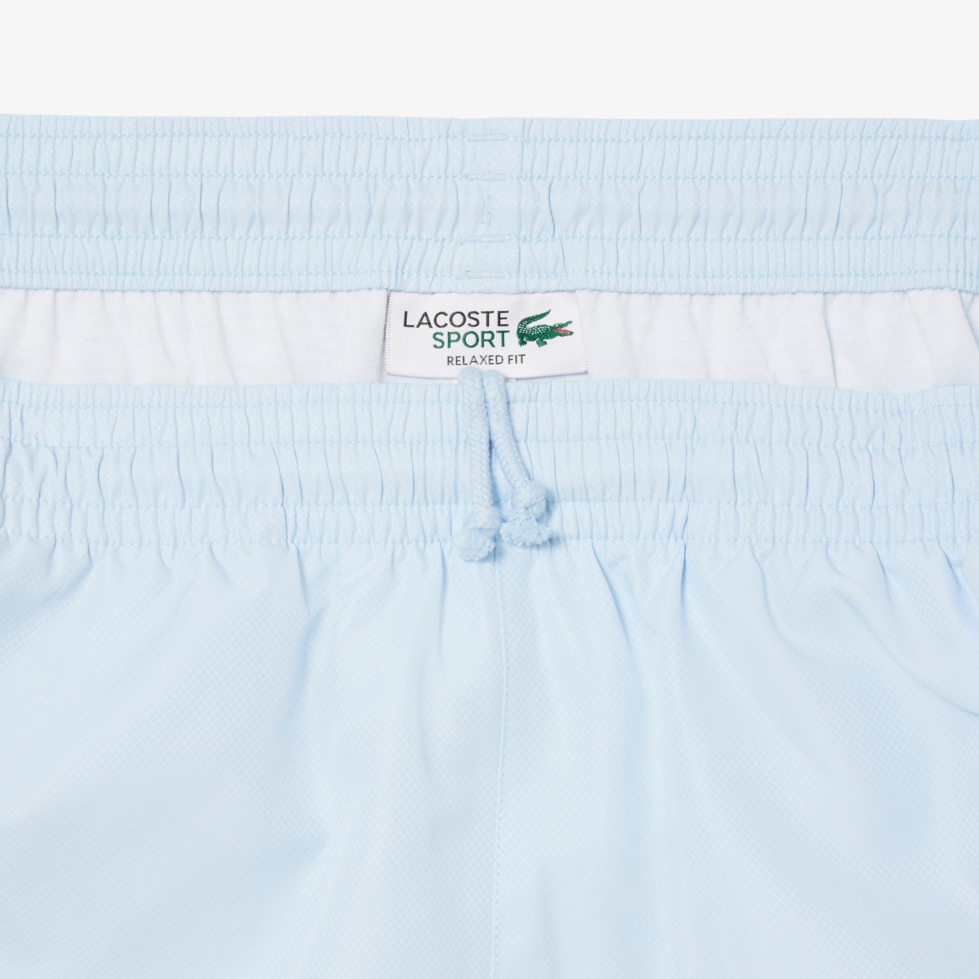 Quần Ngắn Tennis Lacoste Nam Nhẹ Hoạ Tiết Kẻ Sọc Phối Màu