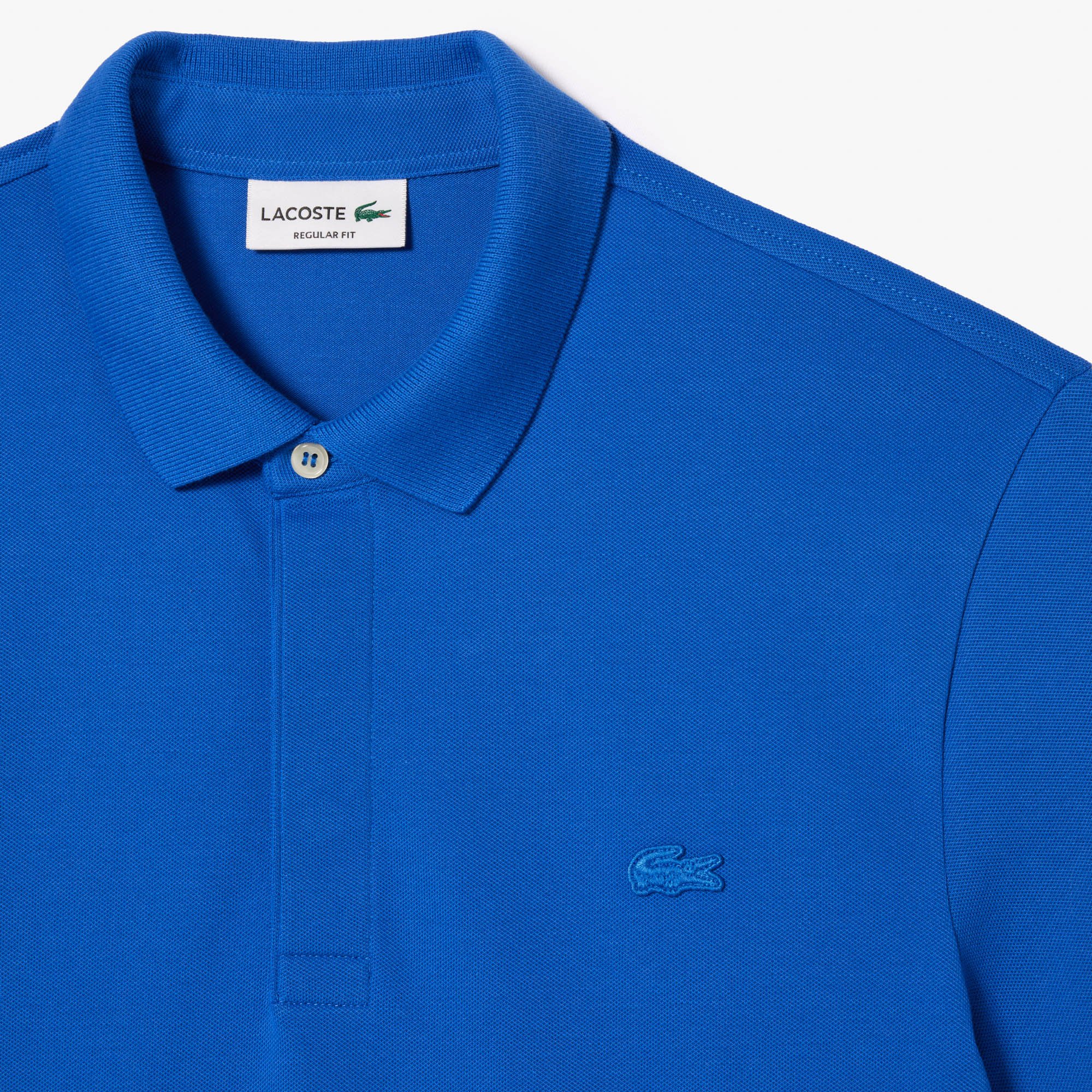 Áo Polo Lacoste Nam Paris Dáng Suông Piqué Co Dãn