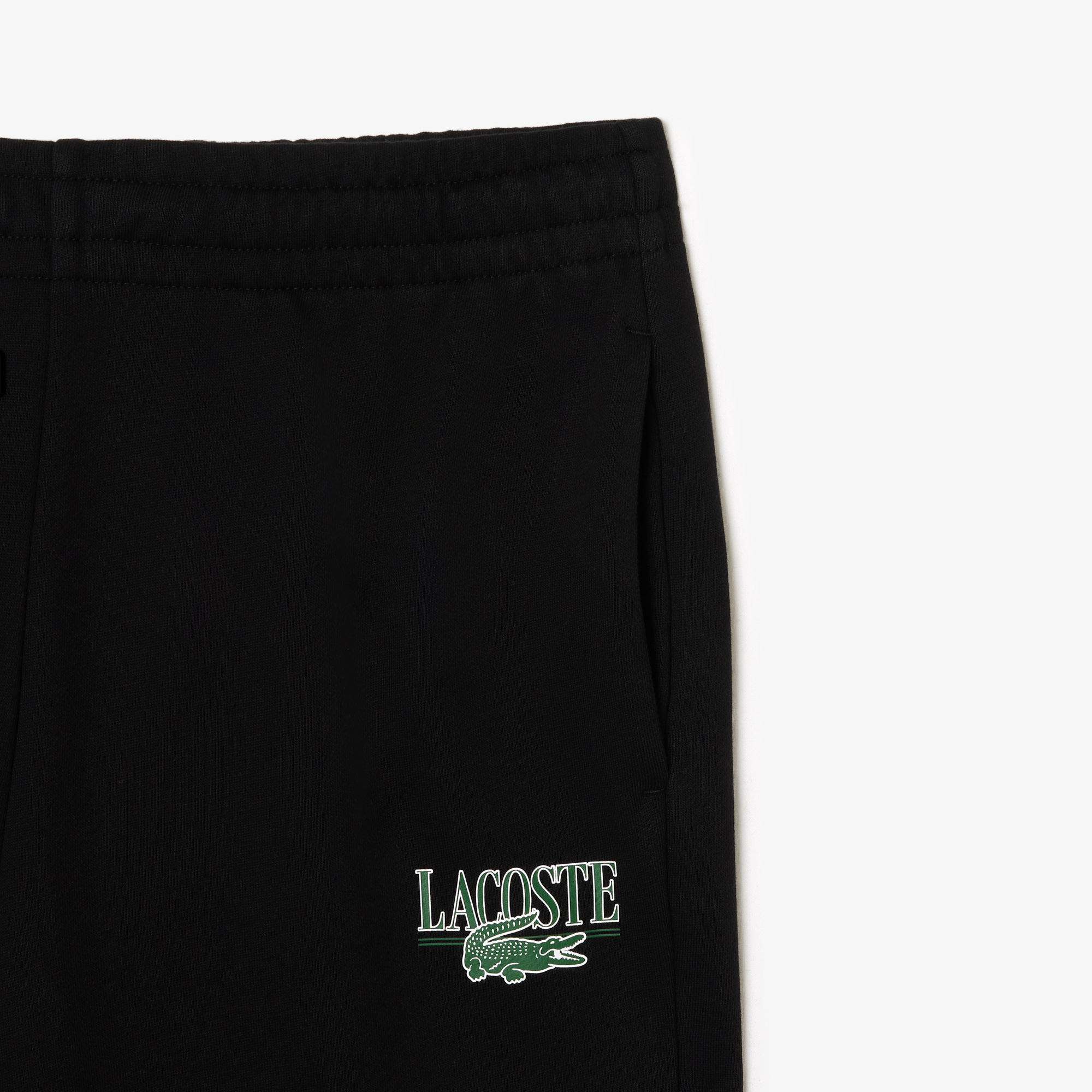 Quần Thể Thao Lacoste Nữ Ống Đứng