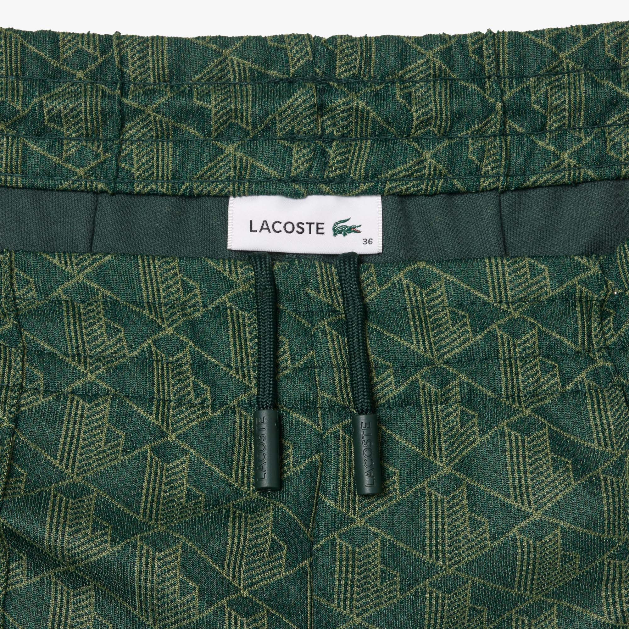 Quần Thể Thao Ống Loe Lacoste Nữ Họa Tiết Monogram