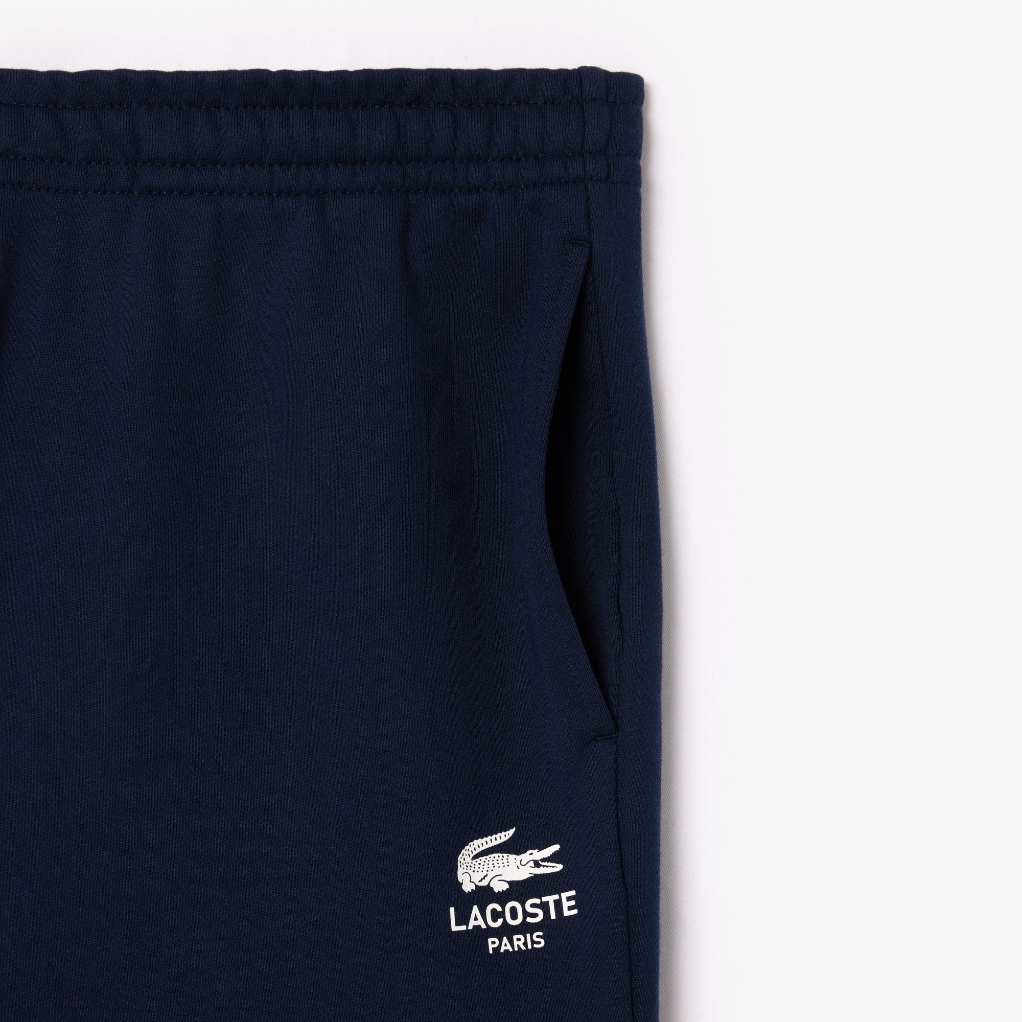 Quần Nỉ Lacoste Unisex Ống Côn