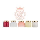Colored glass candle jar with metal hammer effect lid