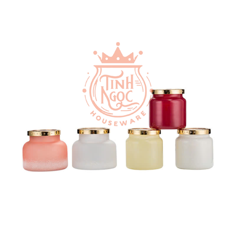 Colored glass candle jar with metal hammer effect lid