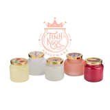Colored glass candle jar with metal hammer effect lid