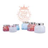 Colored glass candle jar with metal hammer effect lid