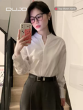  Áo trắng cổ V 