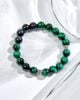 Vòng tay mắt hổ xanh charm trụ