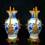  Cặp bình có 2 tai  Chất liệu sứ+đồng Sử dụng đồ trưng bày Kt 1 bình 12*17 nặng 425g 