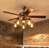 QUẠT ĐÈN CHÙM CỔ ĐIỂN Nguồn sáng: E27x5  Chất liệu: sắt nghệ thuật