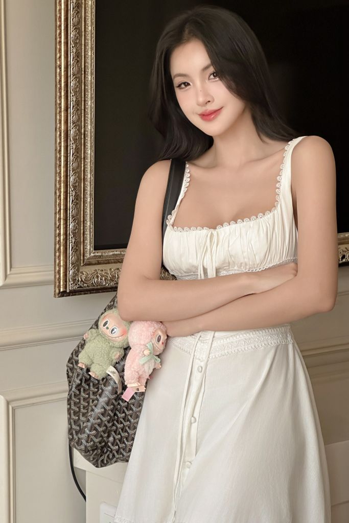 Đầm maxi hai dây cổ vuông dáng dài đính nơ thanh lịch
