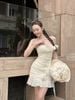 Đầm hai dây ôm dáng xếp ly có đính nơ nữ tính