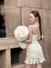 Đầm hai dây ôm dáng xếp ly có đính nơ nữ tính