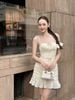 Đầm hai dây ôm dáng xếp ly có đính nơ nữ tính