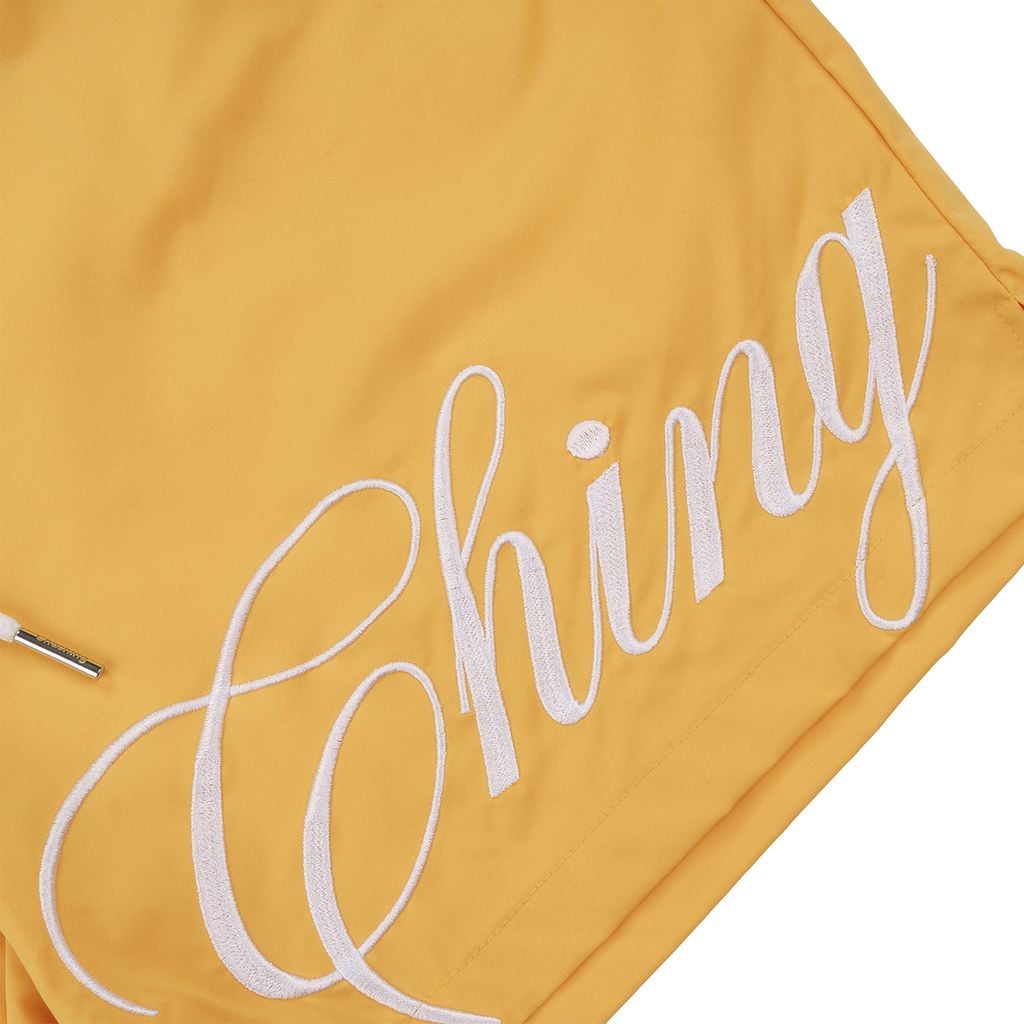 Quần Short Vải Dù Logo Thêu Unisex - Vàng