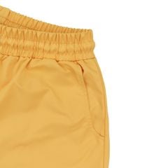 Quần Short Vải Dù Logo Thêu Unisex - Vàng