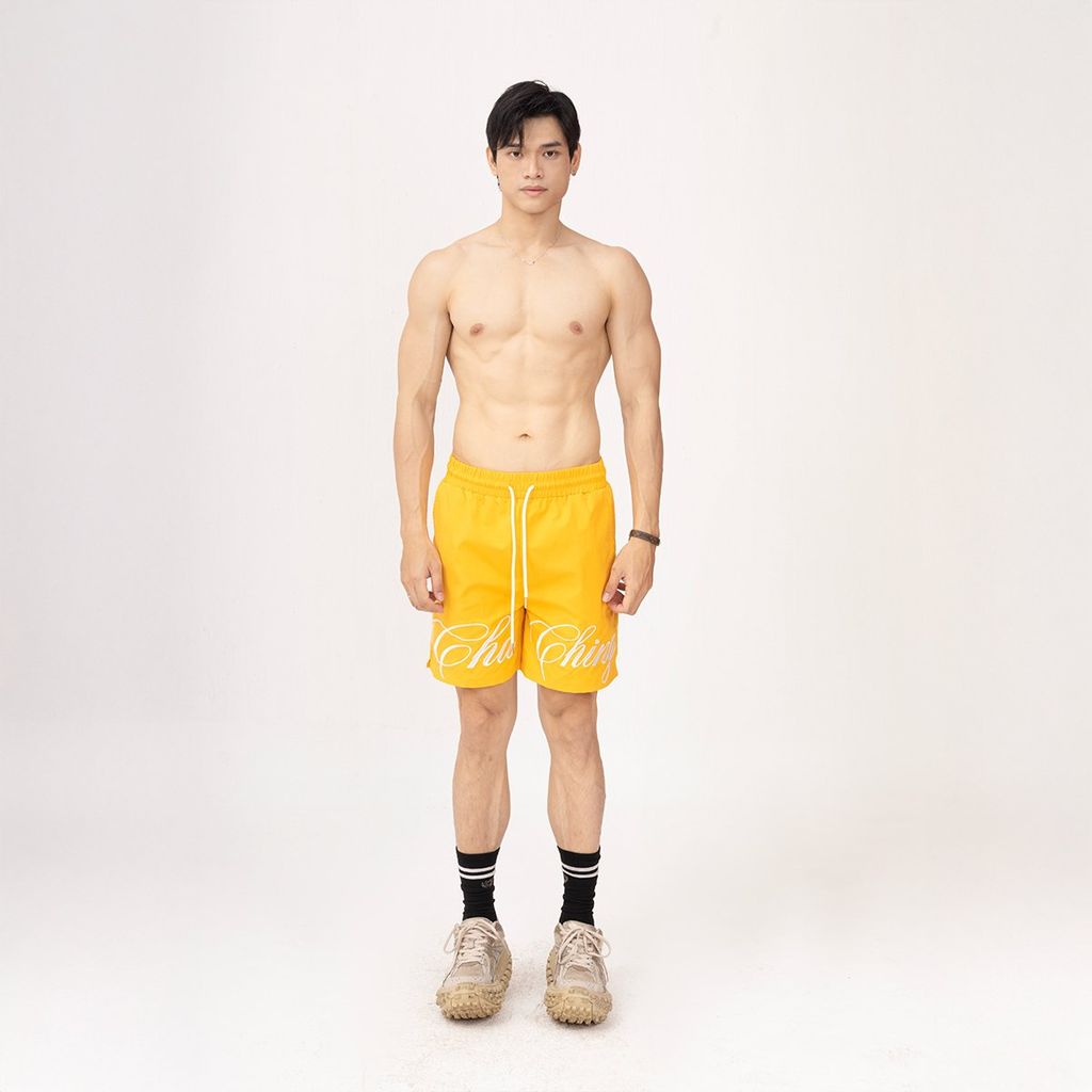  Quần Short Vải Dù Logo Thêu Unisex - Vàng 