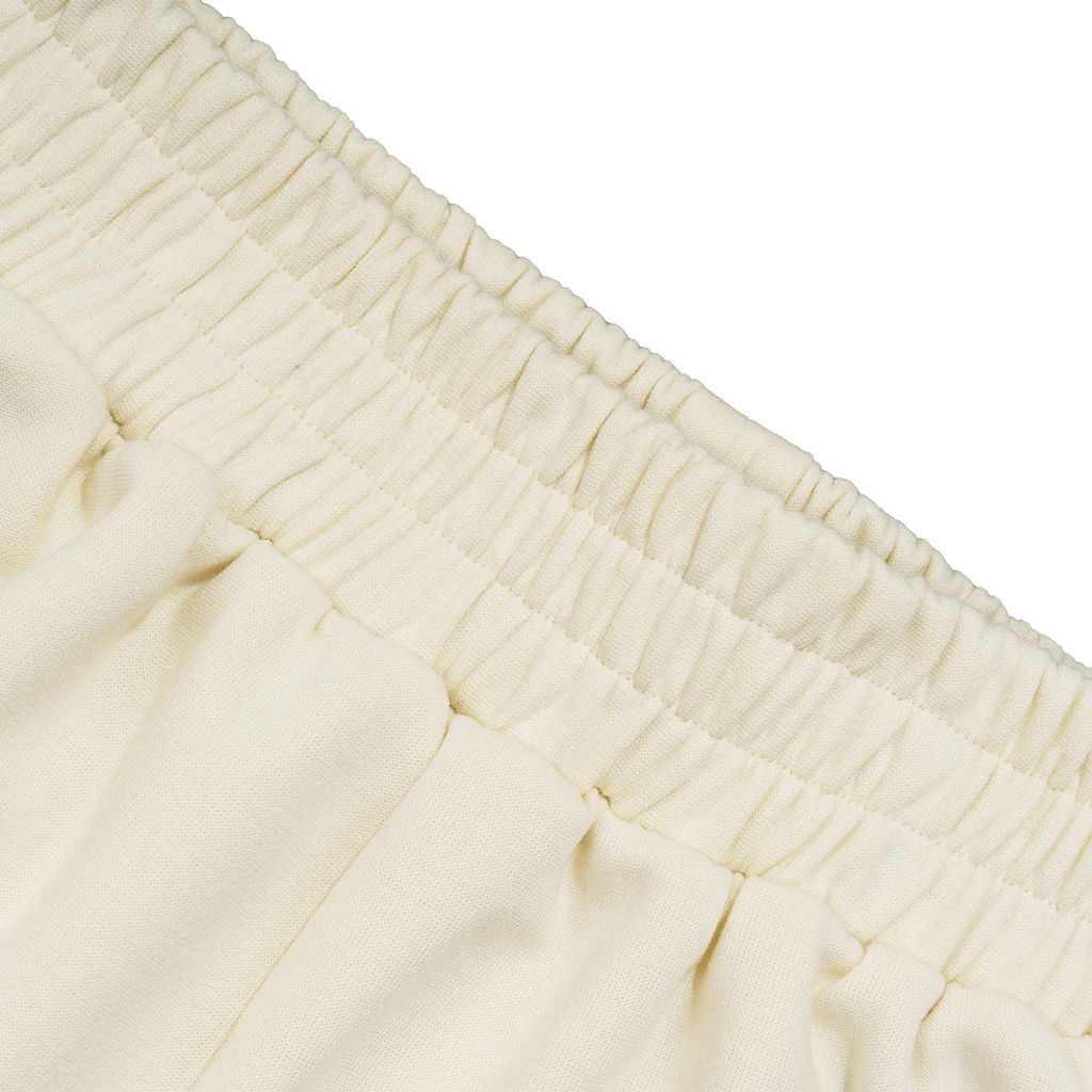 QUẦN SHORT NỈ THÊU LOGO - VÀNG KEM