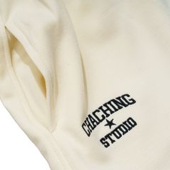 QUẦN SHORT NỈ THÊU LOGO - VÀNG KEM