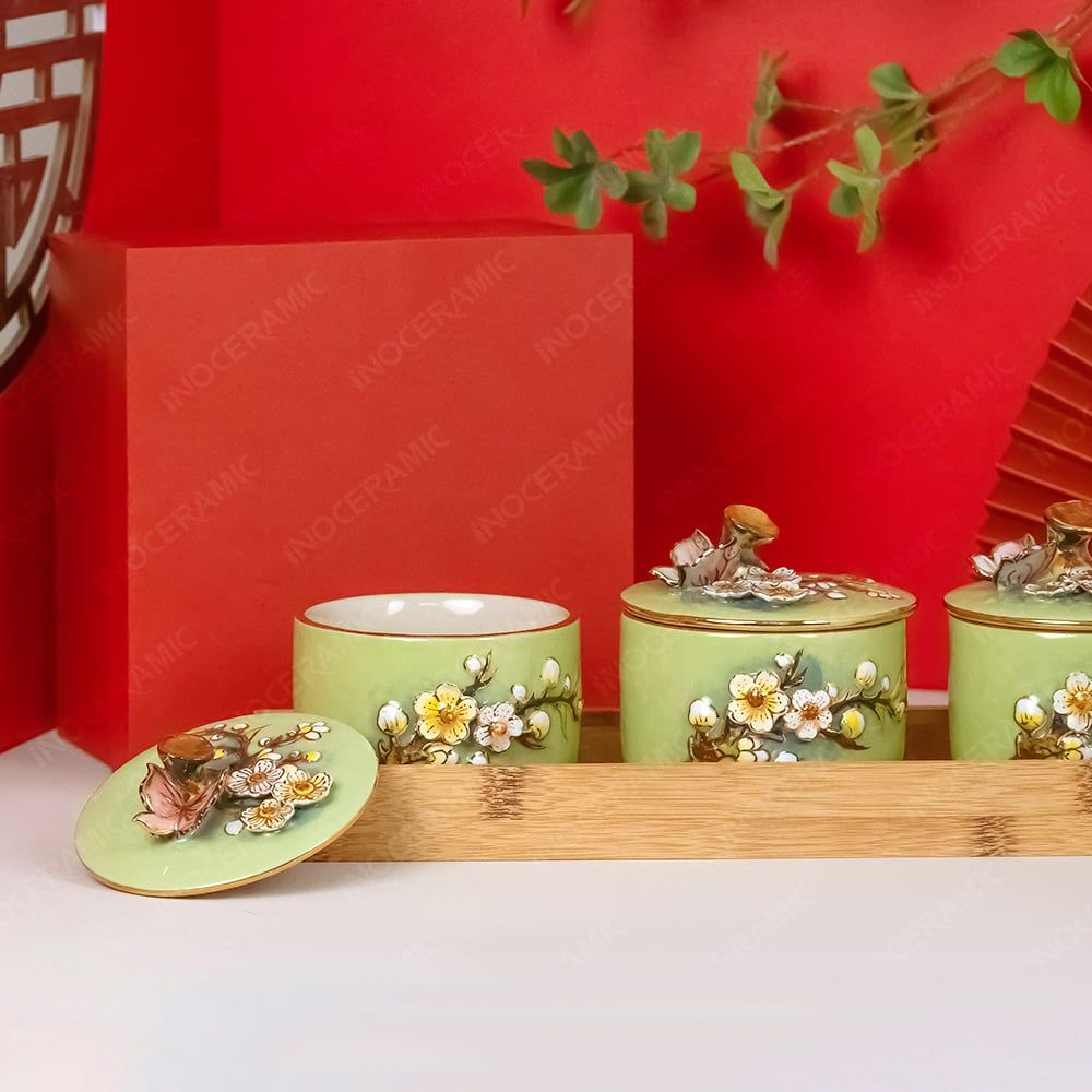 Bộ 03 hũ mứt hoa đào đắp nổi kẻ chỉ vàng