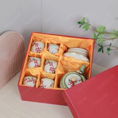 Bộ ấm trà quai đồng men ngọc cành đào đông đỏ vẽ tay