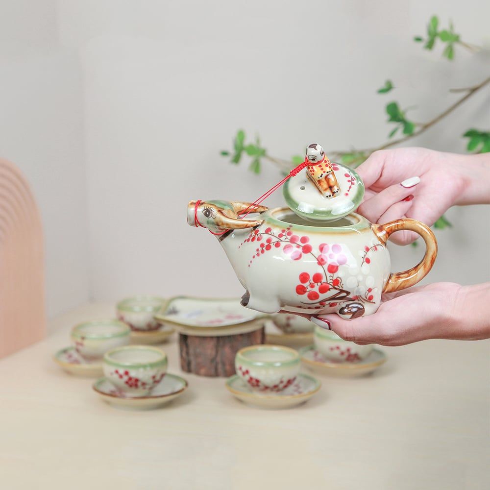 Bộ ấm trà Mục đồng cưỡi trâu men ngọc vẽ đào đông