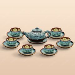 Bộ ấm trà dáng quả thị men hoả biến