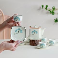 Bộ trà ấm vuông quai đồng men ngà sen xanh vẽ tay