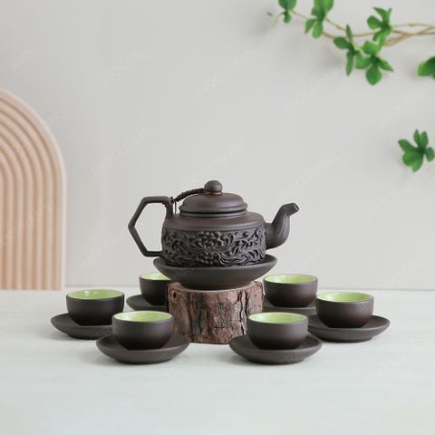 Bộ ấm trà Hồng giang tử sa đen hoa cúc đắp nổi
