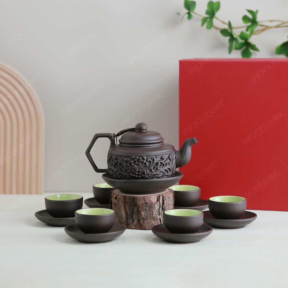 Bộ ấm trà Hồng giang tử sa đen hoa cúc đắp nổi