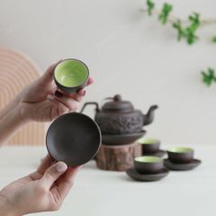 Bộ ấm trà Hồng giang tử sa đen hoa cúc đắp nổi