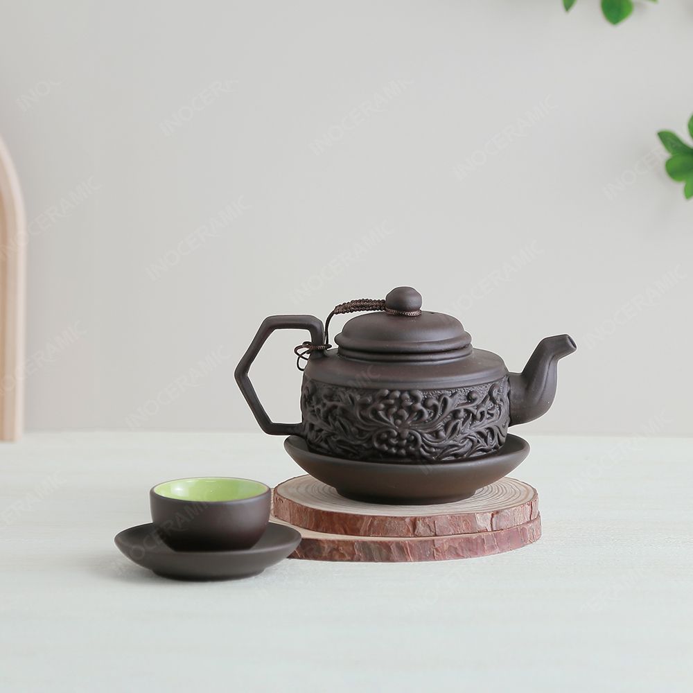 Bộ ấm trà Hồng giang tử sa đen hoa cúc đắp nổi