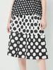 Chân váy chấm bi màu đen trắng