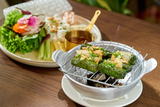  Grilled US top blade beef wrapped in betel leaf with pork lard on rice vermicelli shells 