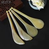 Cây massage sừng kẹo mút kích thước 12cm - 13,5cm độ dày 2,6 - 9mm màu sắc lưa và trắng, dụng cụ massage giúp giảm quầng thâm bọng mắt, giảm sưng 