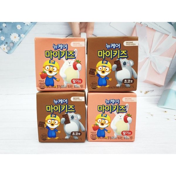 Sữa Dinh Dưỡng Nucare Pororo Vị Socola Và Dâu, Cho Bé Tăng Chiều Cao Cân Nặng Phát Triển Trí Não