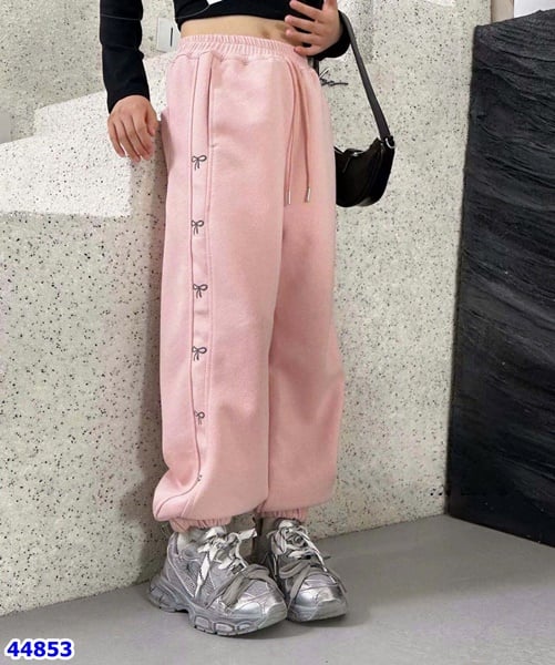 Jogger Nexxi Win hồng nơ - size 9y